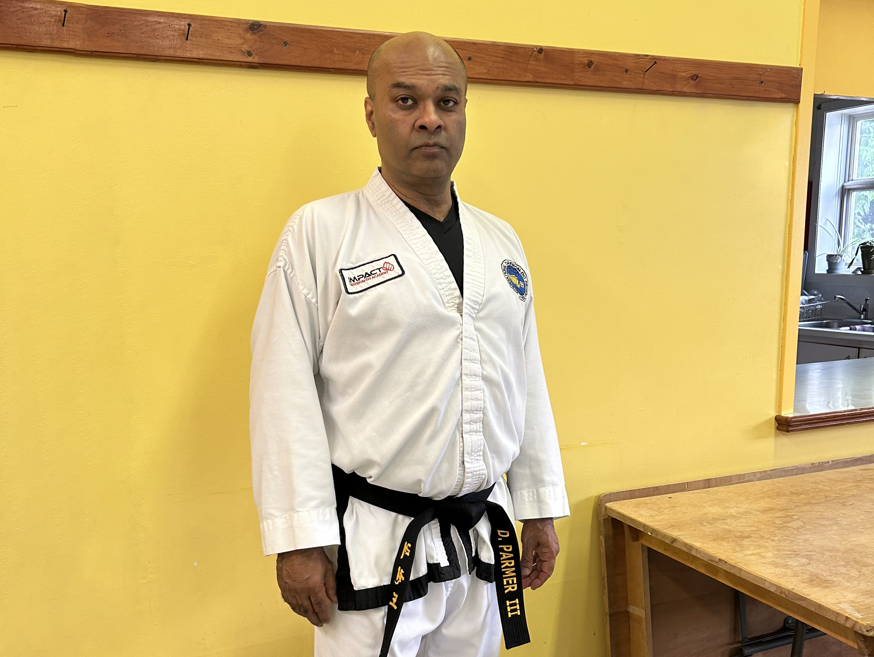 Portrait of a man in martial arts uniform.